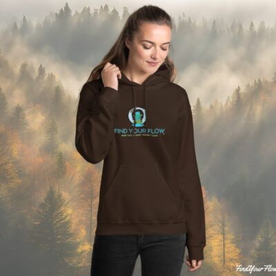 Find Your Flow® Zen Flow Hoodie - Autumn Theme - Woman in hoodie in front of misty forest in a warm glowing sun light.